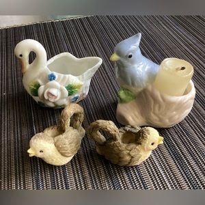 4 little birds candle holders.